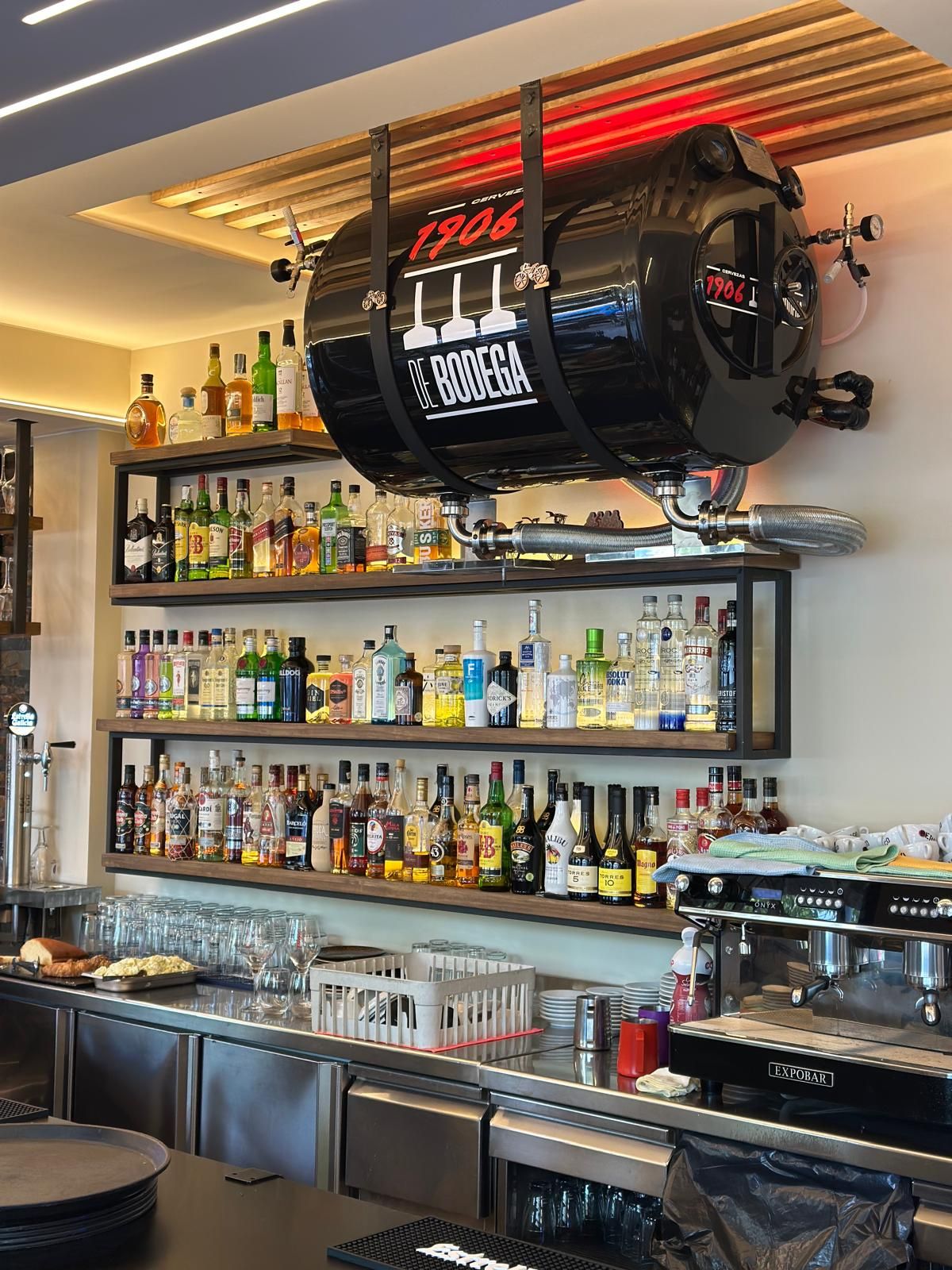 The 1906 cellar beer tank hanging above the bar at Tandem